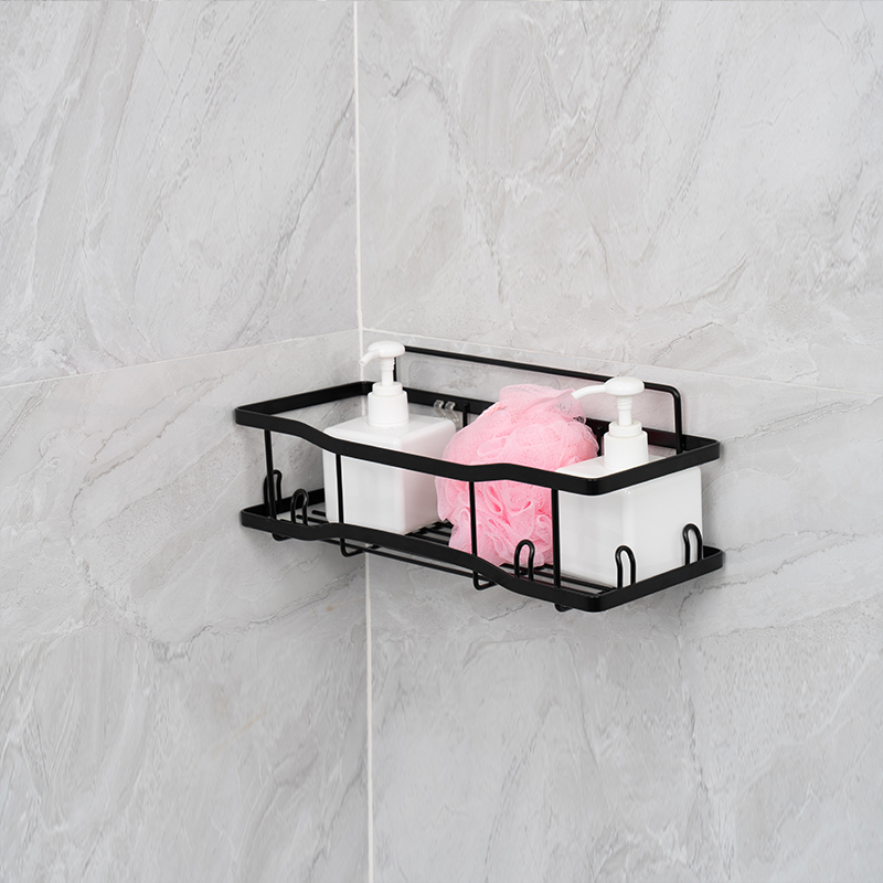 Aan de muur gemonteerde opbergmand van metaaldraad voor keuken en badkamer